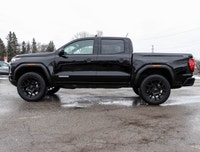 Meet the 2026 GMC Canyon Elevation Crew Cab Short Box 4-Wheel Drive Elevation, a black powerhouse re... (image 4)