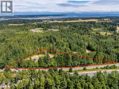 Discover 4.4 acres of versatile potential nestled between Cumberland and Courtenay! This RU20-zoned...