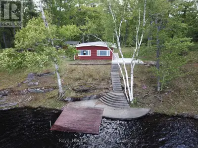 Welcome to an incredibly rare opportunity on the pristine shores of West Twin Lake in beautiful Have...