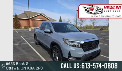 The 2023 Honda Ridgeline is a versatile midsize pickup combining unibody construction, car-like hand...