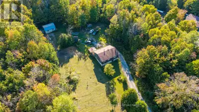 Country Home or Cottage Retreat on 25 Beautiful Acres. Embrace the tranquility of nature in this rai...