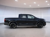 Experience the 2022 Honda Ridgeline Black Edition, where luxury meets functionality. Enjoy keyless e... (image 1)
