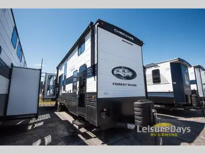 Forest River Timberwolf destination trailer 39DL highlights: Kitchen Island Dual Entry Hide-A-Bed So...