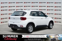 Navigate urban landscapes effortlessly in the 2024 Hyundai Venue Preferred Sport Utility, designed f... (image 5)