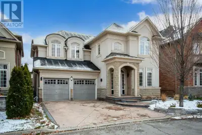 Executive detached home in sought-after Lakeshore Woods offering over 3,000 sq ft above grade and a...