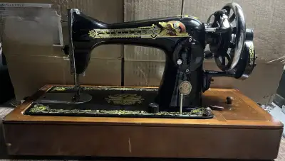 Vintage Singer Sphinx Sewing Machine Comes with carrying case and accessories Untested, selling as-i...