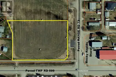 Ready for your development - 1.8 acre lot at the corner of paved Twp Rd 500 and paved Range Road 73....
