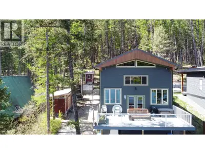 Visit REALTOR website for additional information. Tucked away in an exclusive, private setting, this...