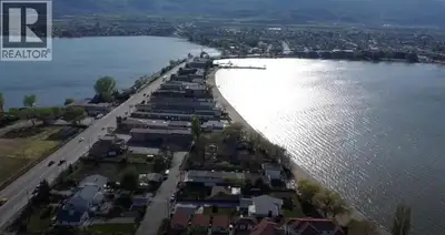 WATERFRONT & SANDY BEACH - EXCEPTIONAL OPPORTUNITY ON OSOYOOS LAKE!!! Whether you are looking to kee...