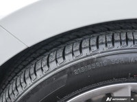 * Dual-zone automatic climate control * Heated, leather-wrapped steering wheel * Heated front seats... (image 9)