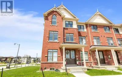 Welcome to 428 Tim Manley Ave (For Lease) - a stunning corner-lot end-unit townhouse that feels more...