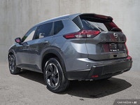 This AWD Rogue features a turbocharged engine, heated front seats, heated steering wheel, and a pano... (image 2)