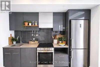 Spectacular corner unit at Dundas Square Gardens offering 2 bedrooms plus media and 2 full baths, 1...