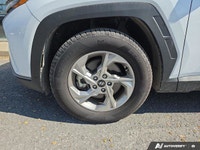 This Tucson comes with; Rear Defrost, Front Wheel Drive, Power Door Locks, Brake Assist, Power Steer... (image 9)