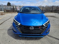 Buckle up, because this 2023 Nissan Versa SR CVT in Electric Blue Metallic isnt just a carits your t... (image 9)