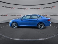 This Volkswagen Jetta has a powerful Turbo Gas 4cyl 1.5L engine powering this Automatic transmission... (image 4)