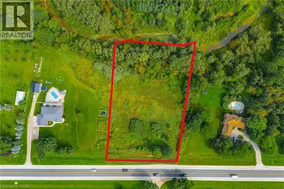 This stunning 1.28-acre lot offers the perfect blend of privacy, nature, and convenience - just minu...