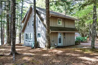 This is the lakeside retreat you've been waiting for! Tucked away on the highly sought after Canoe I...