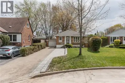 A fantastic opportunity to own a detached bungalow on a spacious pie-shaped lot in the highly sought...