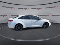 This used 2025 Toyota Corolla SE 2WD | Sunroof | Heated Steering Wheel is a smart hybrid sedan for d... (image 8)
