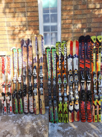 Nice Atomics Sets of Skis any mountain With  Bindings and Boots.