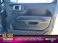 This Jeep Wrangler delivers a Gas/Electric V-6 3.6 L/220 engine powering this Automatic transmission... (image 8)