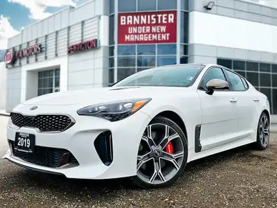 The 2019 Kia Stinger GT in an eye-catching White color with AWD drive technology offers remarkable h...