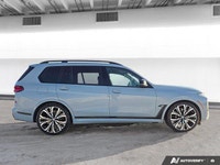 This *2023 BMW X7 M60i* is powered by a high-performance 4.4L twin-turbo V8 hybrid engine paired wit... (image 6)