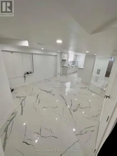 Enjoy this ample space with its own legal entrance, this walk-up basement ensures both safety and pe...