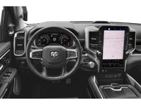 The 2026 Ram 1500 Tungsten, finished in a pristine white, epitomizes power and control with its 44 d... (image 3)