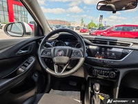 This *Buick Encore GX Select* is powered by a *1.3L turbocharged I3 engine* paired with a *9-speed a... (image 9)