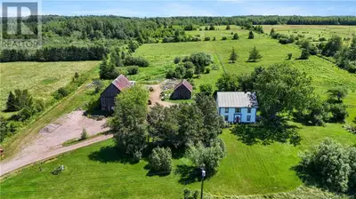 59+ Acres of Country Charm with Endless Possibilities! Nestled in picturesque Memramcook, this centu...