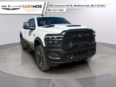 Experience the power and presence of the 2026 Ram 2500 Rebel 4x4 Crew Cab, resplendent in a pristine...
