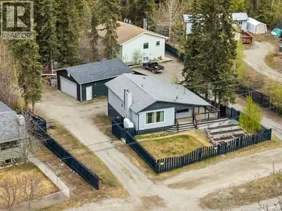 Welcome to 2102 Centennial Street, a rare Porter Creek opportunity zoned RMM (Residential Multi-Unit...