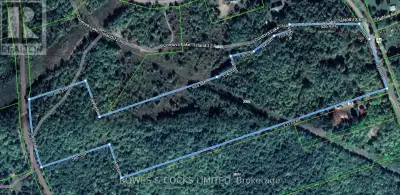 Over 30 Acres of land on a hard top road 10 minutes from amenities. Multiple entrances, poured concr...