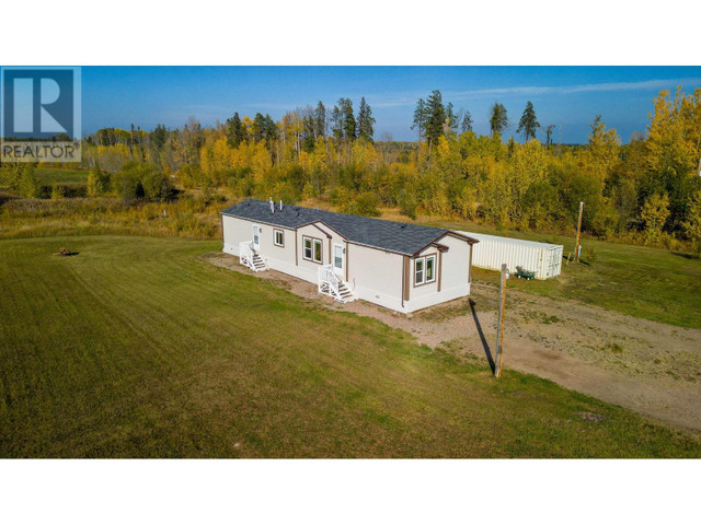 199 MCCONACHIE CREEK ROAD Fort Nelson, British Columbia in Houses for Sale in Fort St. John