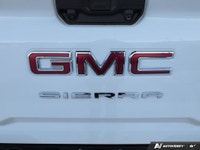 The new 2026 GMC Sierra 2500HD SLT in a bright white finish with 44 drivetrain is engineered for the... (image 9)