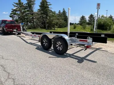 Tandom boat trailer aluminum $5499 5900 capacity OPTIONAL PREIMIUM BUNK SYSTEM $499 ALUMINUM WHEELS...