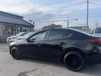 2014 Mazda 3 S Grand Touring automatique absolument tout équipé avec toit ouvrant afficheur projecte... (image 1)