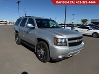 The 2013 Chevrolet Tahoe LT 4WD 1500 LT combines full-size SUV capability, spacious comfort, and pro... (image 1)