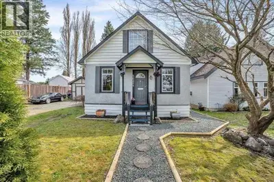 Directly across the street from Tolmie Park is this charming 2 level plus basement home on a large &...