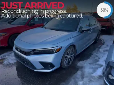 The 2022 Honda Civic Sedan Touring CVT Sedan is a stunning blend of style and performance, featuring...