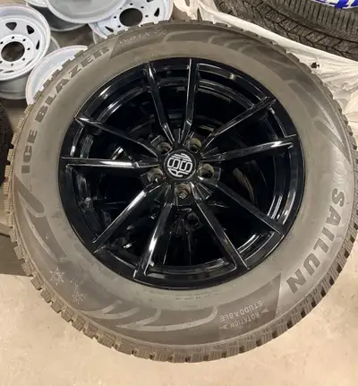 Set of 4 225/65R17 Sailun Iceblazer WSTX factory studded tires on black alloy Grid wheels. Wheels ar...