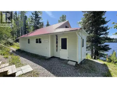 Nestled along the peaceful shores of Cluculz Lake, this beautiful property has been lovingly held by...