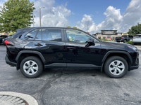 Command the road in this sleek 2023 Toyota RAV4 LE, boasting a Midnight Black Metallic exterior that... (image 3)