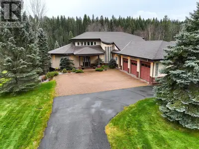 * PREC - Personal Real Estate Corporation. Luxurious riverside living! A breathtaking executive home...