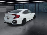 The 2020 Honda Civic Si Sedan in white offers a dynamic driving experience with its FWD drivetrain a... (image 7)