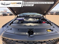 The 2026 Ram 1500 Rebel is the epitome of rugged sophistication. This Gray beauty, equipped with 44... (image 6)