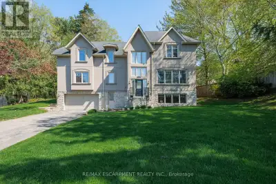 Welcome to 1034 Lakeshore W, a beautifully designed home ideally located just steps from the lake, p...