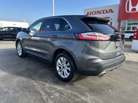 Seamlessly merge dynamic performance with premium comfort in the 2024 Ford Edge Titanium. Finished i... (image 6)